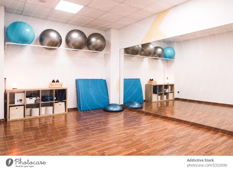 Multipurpose room with pilates balls exercise gym home mirror fit ball training fitness interior reflection equipment workout physical domestic practice light