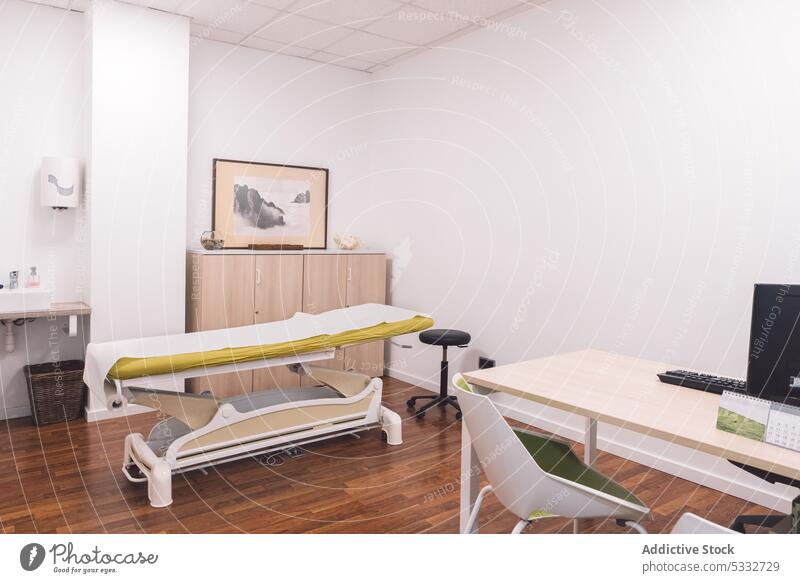 Interior of modern clinic with equipment medical design interior room hospital medicine health care table sink cupboard furniture contemporary professional
