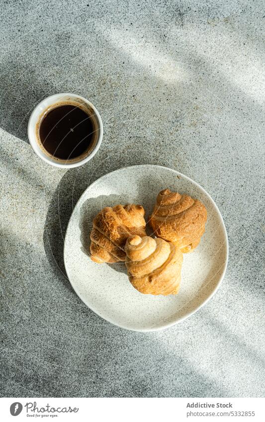 Morning coffee with croissants breakfast food beverage baked tray background black coffee concrete crusty cup daytime drink eat eating dish espresso european
