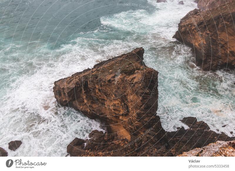 Rocky coastline of the Atlantic Ocean in the south-west of Portugal in the Algarve region. Exploring the beautiful rugged nature of the Fisherman Trail. Cape St. Vincent