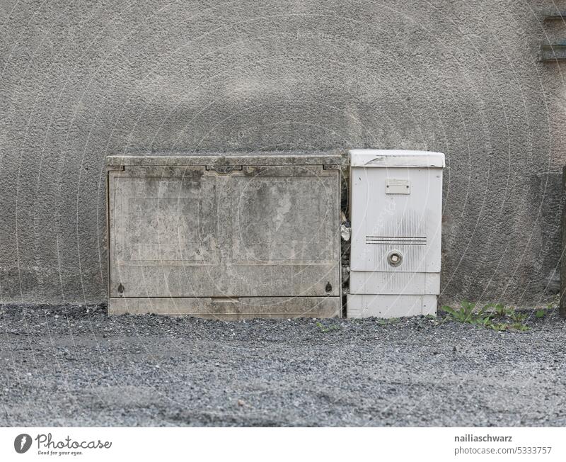 power box gray color Structures and shapes Plaster Box-shaped Energy Morbid Broken grey background Power consumption Energy industry Electrical circuit Deserted