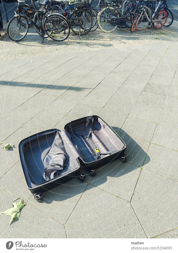 Suitcases in Berlin pavement Bicycle Open Deserted Street Colour photo left