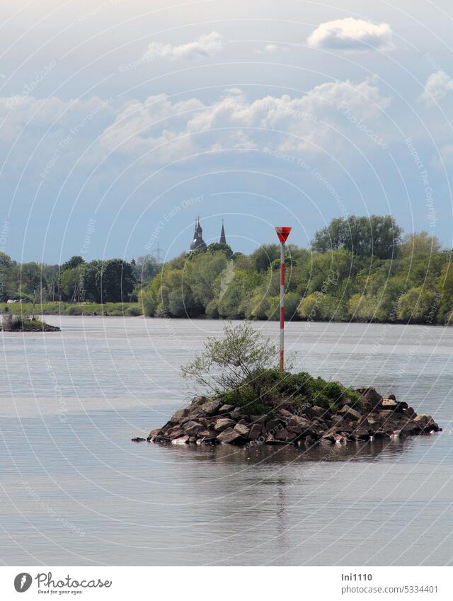 MainFux |Stone islands in the Main River in the background towers of the Seligenstadt monastery and basilica Landscape Water Pole red white Triangle Sign