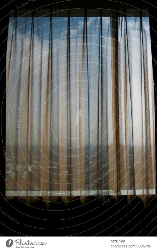 Transparent curtain closes the window, indoors. white background transparent decoration fabric abstract light material textile texture design detail pattern