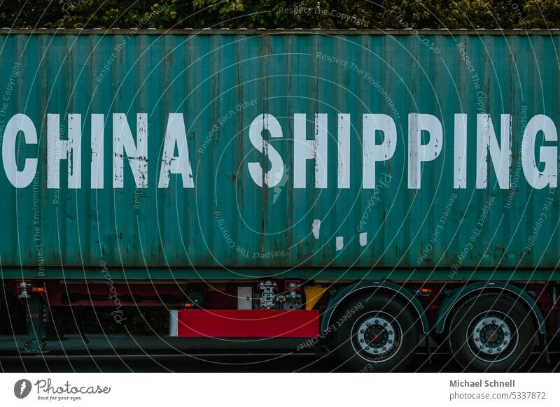 Truck with a container for trade with China Container Container cargo Logistics Container terminal Harbour Trade Industry Economy Exterior shot Transport