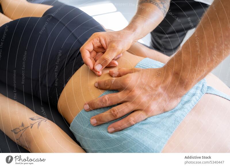 https://www.photocase.com/photos/5340447-crop-male-therapist-inserting-fine-needle-in-back-of-female-client-photocase-stock-photo-large.jpeg