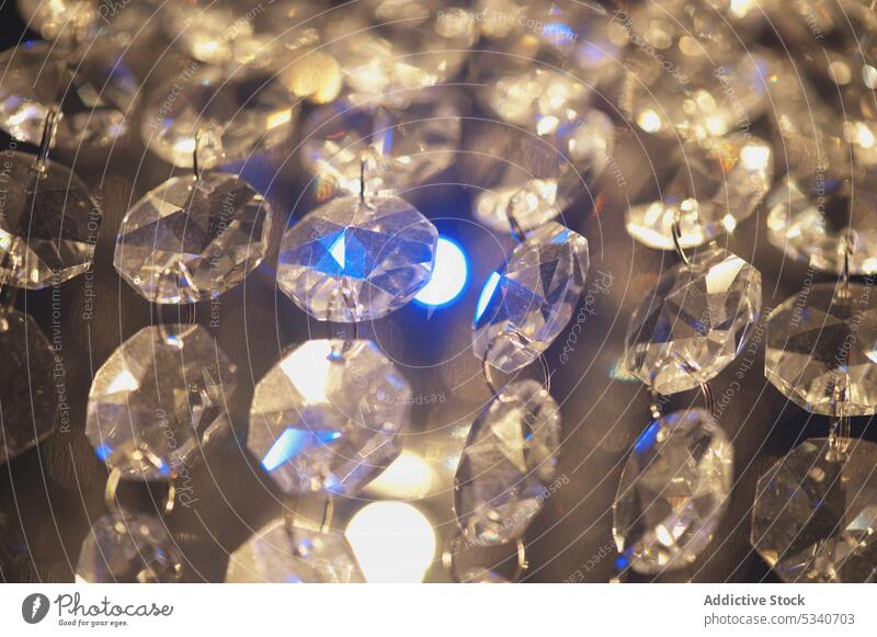 Close-up of shining crystals in chain diamond chair abstract background glow luxury jewelry shimmer sparkles light wealth many ornamental rich design glimmer