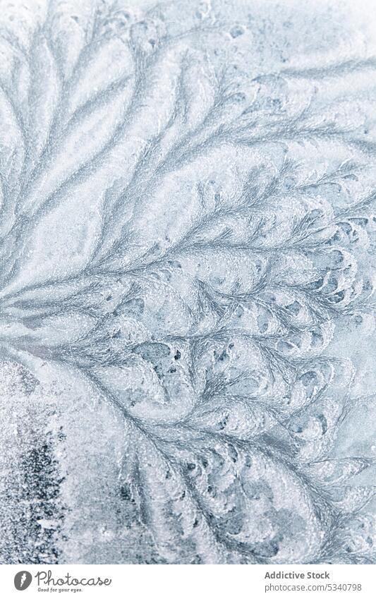 Abstract ice textures on car window in winter background frost cold glass pattern freeze season abstract closeup snow blue cool crystal light design water icy