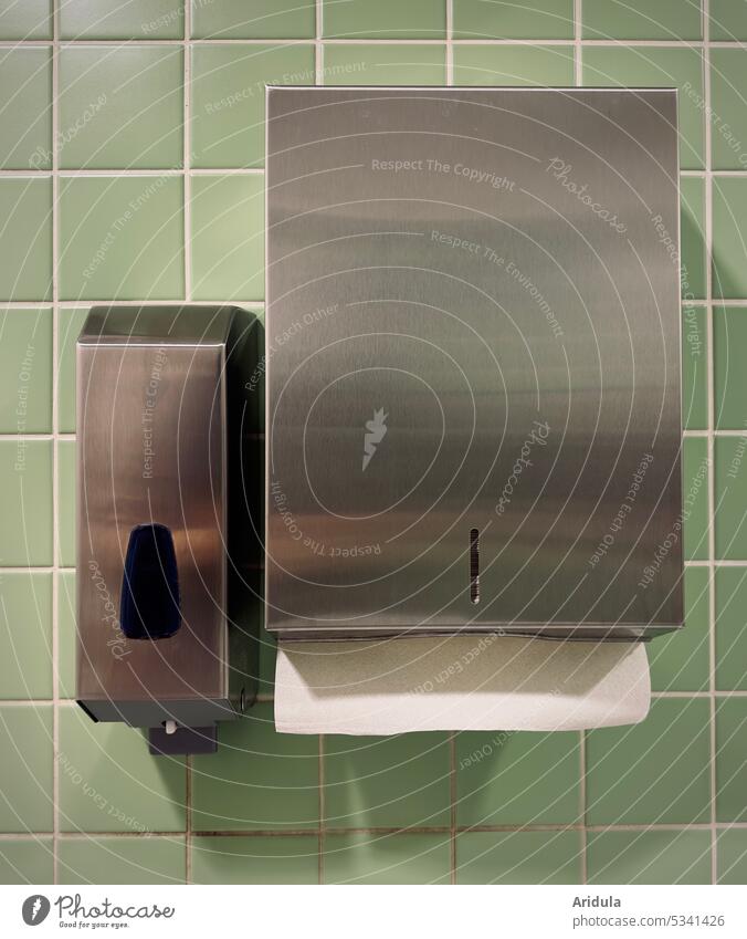 Stainless steel soap dispenser and paper towel holder in green tiled toilet High-grade steel Paper towel holder Soap Toilet Washing hands hygiene Green Tile