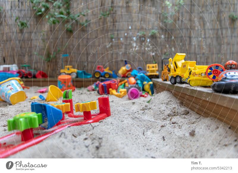 Box for digging with toys Berlin dig box Toys Sand Backyard Pankow Courtyard Town Exterior shot Day Deserted