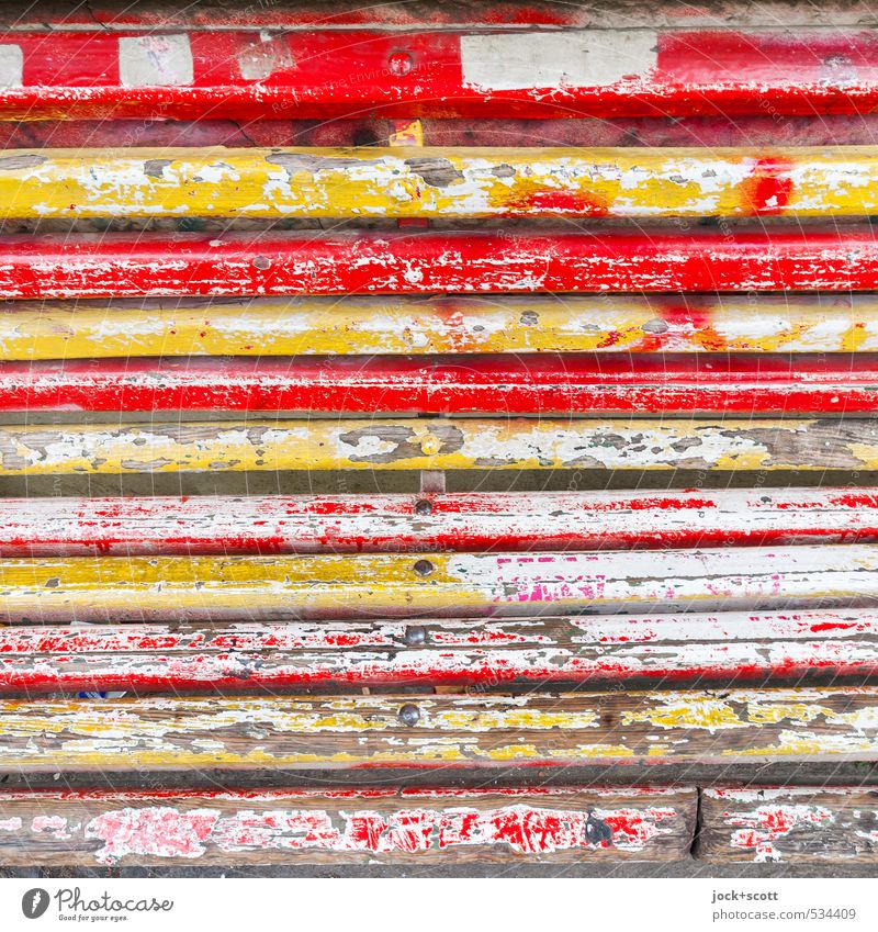 Layer by layer of a wooden bench Old Authentic Retro Yellow Red Decline Transience Change Wooden board Varnish Ravages of time Weathered Multicoloured Detail