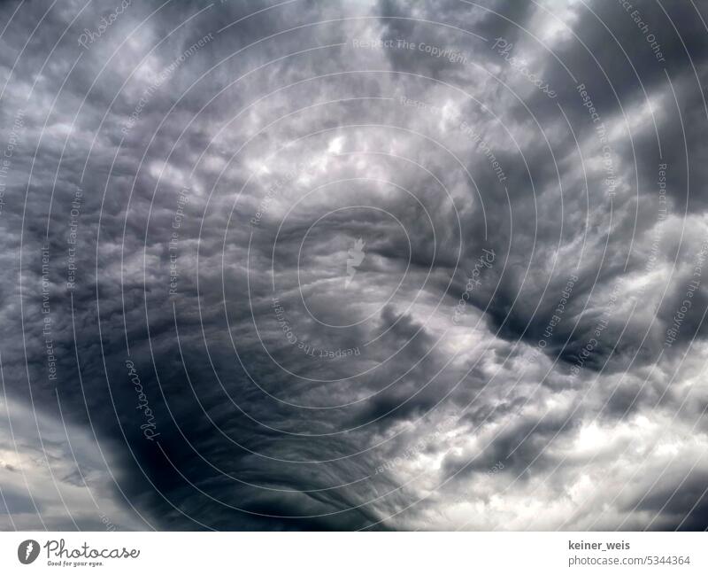 Threatening clouds in the dark sky look like an abstract mood picture of fear Clouds Dark Ambience Abstract Fear Sky Thunder and lightning Storm Weather