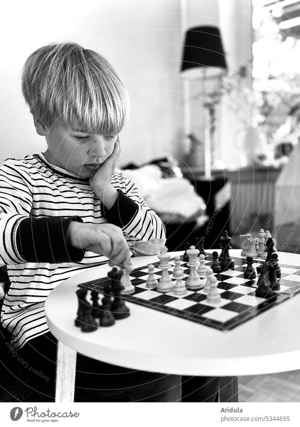 The master and his final opponent | child plays chess against himself Infancy Child Chess chess game Chessboard Chess Player Chess piece Piece Playing White