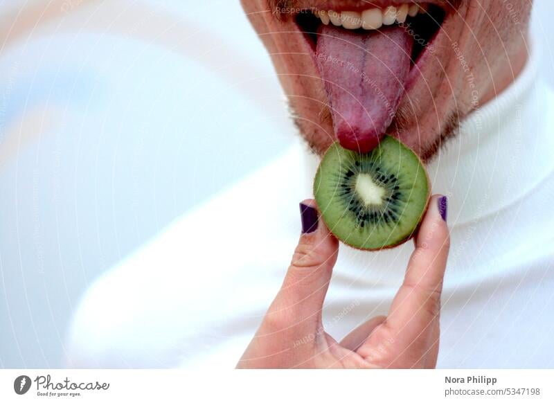 Tongue licks kiwi ll taste good Kiwifruit vitamins sexy Mouth Teeth fingernails devotion Brash Sex Oral sex Theatre Funny Stick out show tongue
