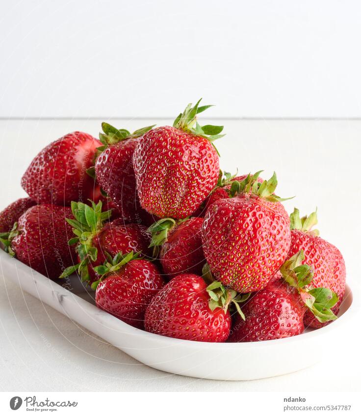 Ripe red strawberry on white background ripe fruit food fresh diet juicy freshness sweet harvest nobody