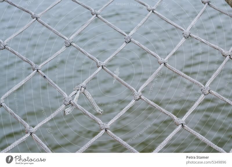 Catch net with knots - a Royalty Free Stock Photo from Photocase