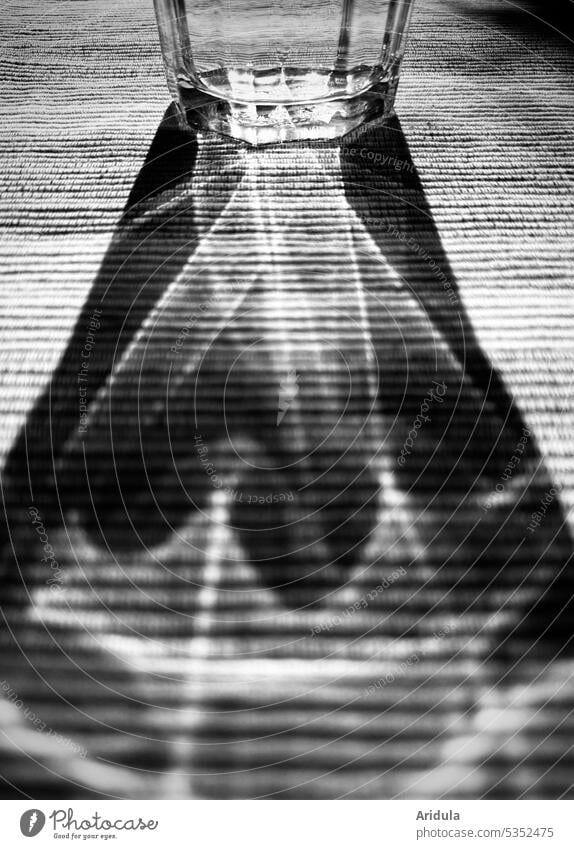 Glass and light No. 1 Light Sun reflection b/w Table out Transparent Black drinking glass tablecloth Pattern structure Shadow Sunlight Shadow play