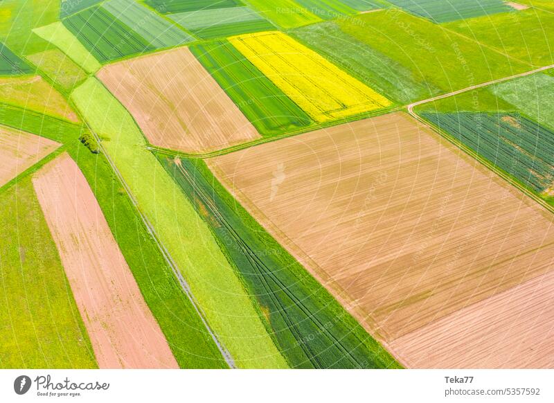 a farming landscape from above faming landscape countryside meadow earth modern farming tractor food farming animal farming
