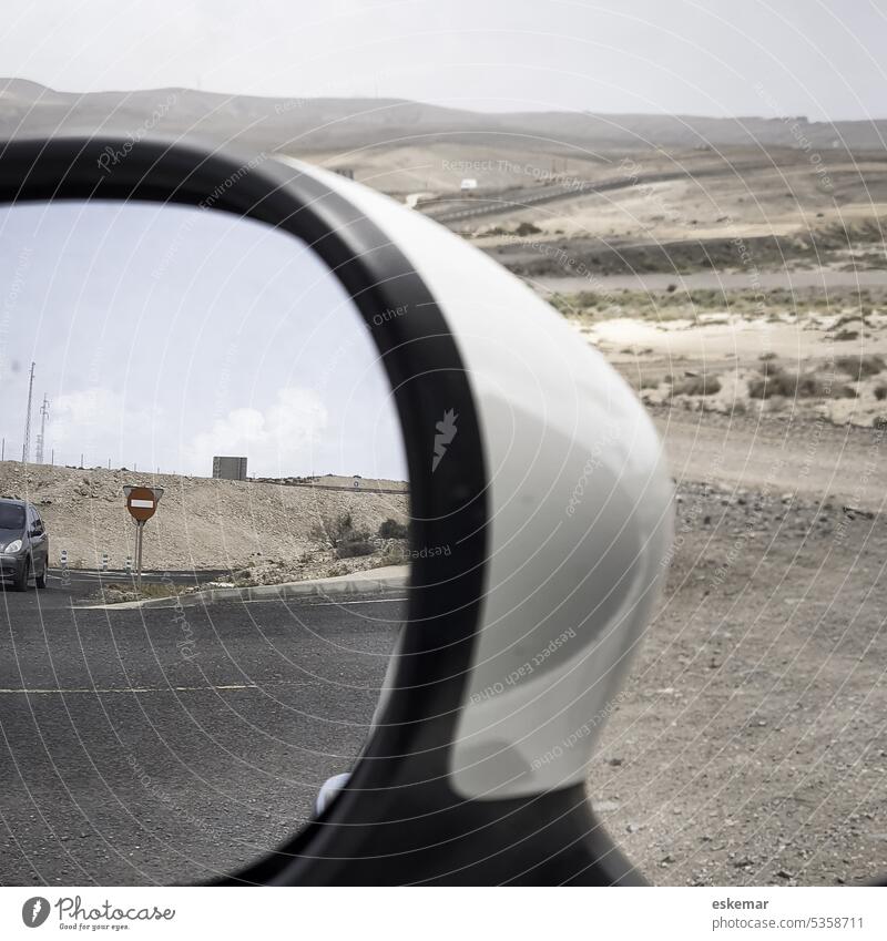Fuerteventura rear view mirror of a car Steppe Transport Logistics Reflection Sand Vacation & Travel Passenger traffic Day Lanes & trails Colour photo