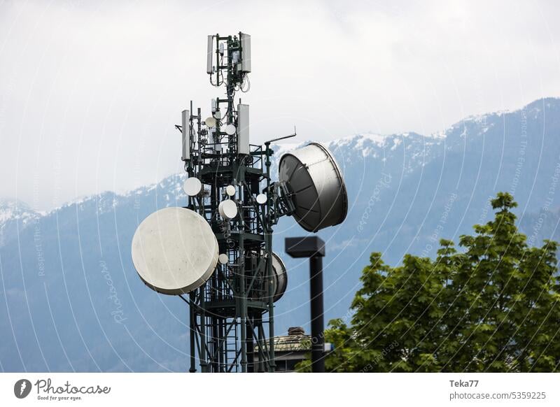 communication antennas in a city television radio radio communication satellite data satelitte antenna pylon mountains
