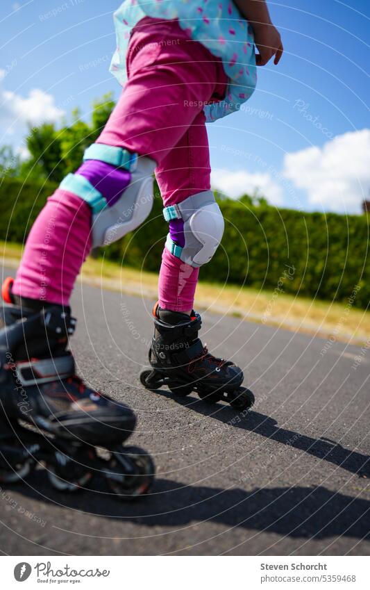 Inline skating on the street Inline skates Sports Exterior shot Leisure and hobbies Joy Human being Colour photo Driving Athletic Day Movement Child Street