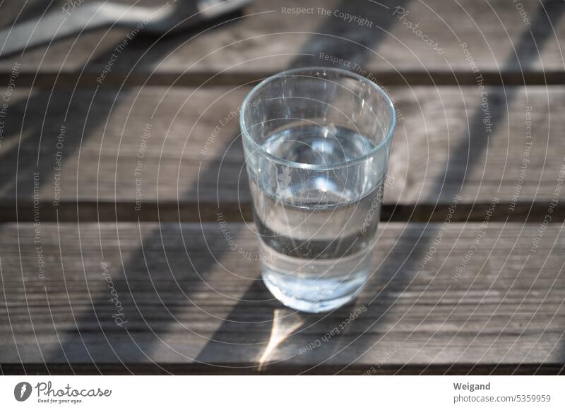 Water glass in summer on balcony Glass Summer Thirst Drinking Clarity clear h20 water scarcity Break Fasting fasting unadulterated