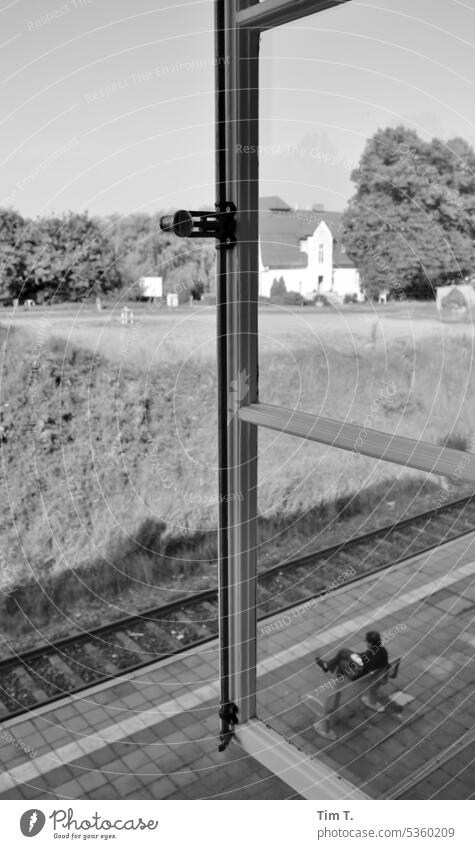 View from the top of a platform Train station Mecklenburg-Western Pomerania pre-Pomerania Platform Window b/w Summer Village