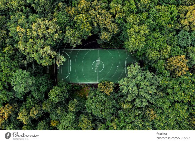 football field in summer deciduous forest, aerial green soccer field aerial view schooler green aerial nature outdoor top view sport landscape travel beautiful
