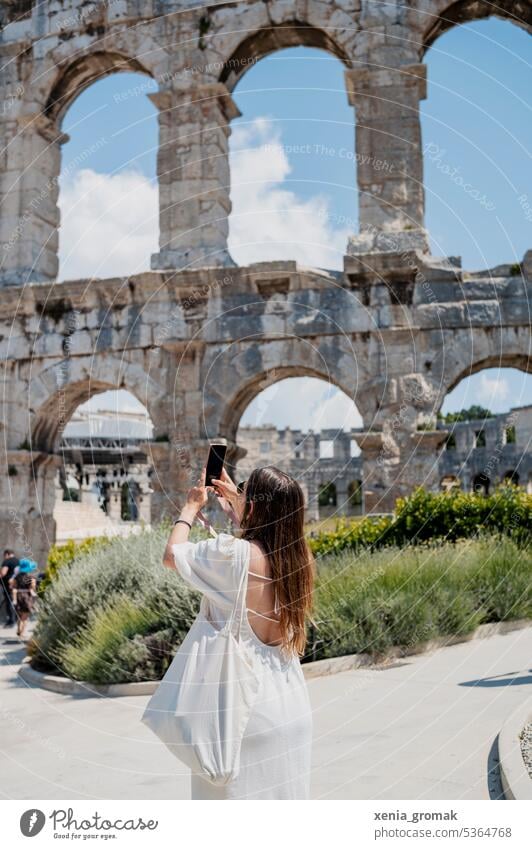 Woman takes photos of Colosseum pula Tourism student life Tourist Architecture Europe Historic Exterior shot Landmark Monument Tourist Attraction