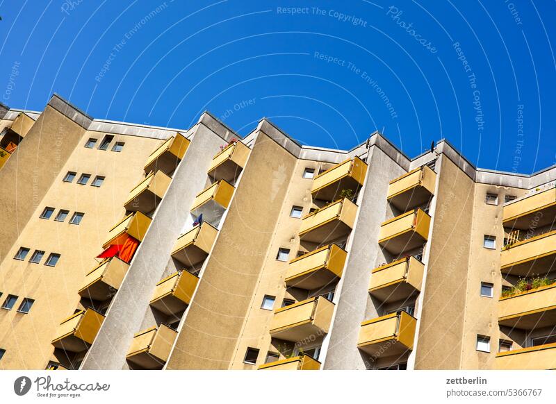 block of flats Old building on the outside Fire wall Facade Window House (Residential Structure) Sky Sky blue rear building Backyard Courtyard