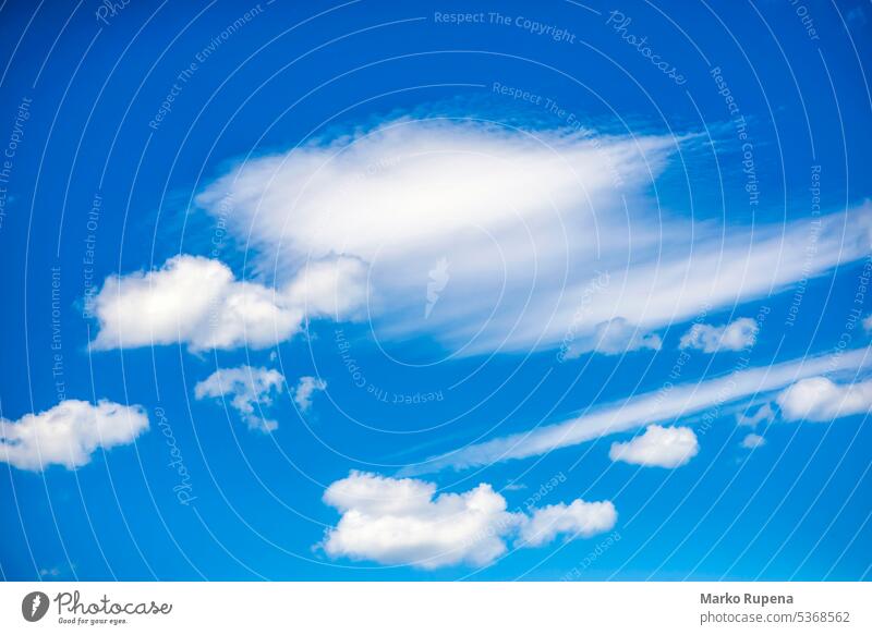 Fluffy clouds on azure blue sky meteorology fluffy nature summer background weather day heaven vibrant light cloudy air beautiful color bright overcast natural
