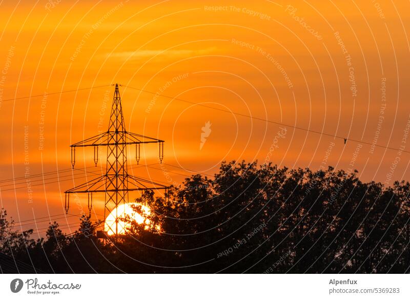 Energy in the evening Electricity pylon Sunset Evening Sky Energy industry Clouds Twilight Colour photo High voltage power line Exterior shot Sunrise Deserted