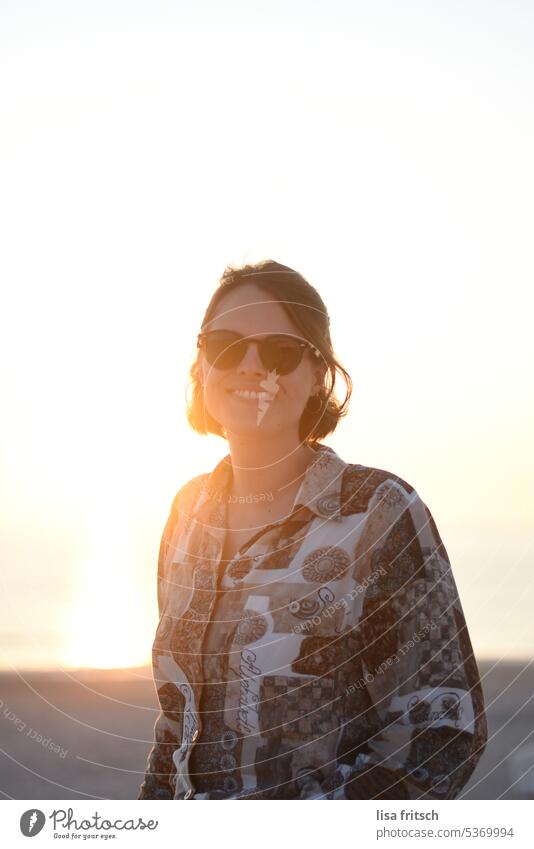 SUMMER FEELINGS - ENJOY THE SUN Sunlight Sunglasses Woman 30-35 years Short-haired Dusk Beach Ocean Adults Colour photo Exterior shot Brunette Vacation & Travel