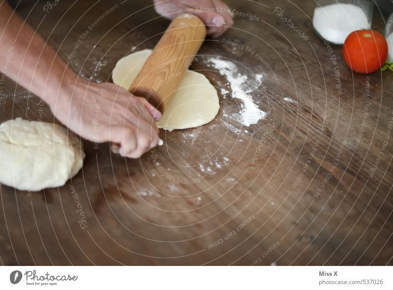 pizza dough Food Vegetable Dough Baked goods Bread Nutrition Hand Delicious Rolling pin Roll out Pizza Tomato Italian Food Colour photo Interior shot
