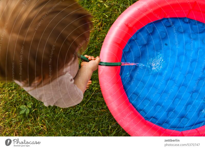 Paddling pool fill again Refreshment Relaxation holidays Garden stop ardor heat wave midsummer Child Toddler Hose Summer vacation Water at home Water hose