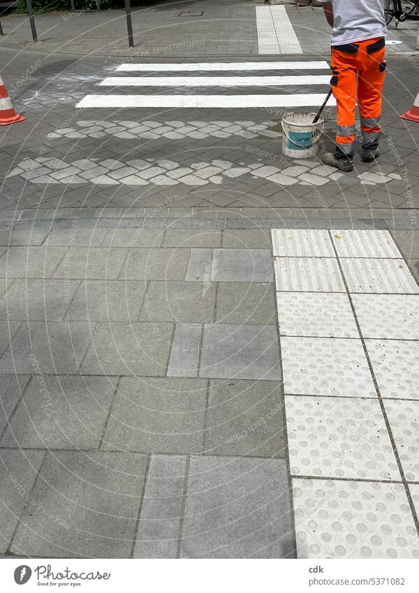 gray in gray | white stripes are needed! | a crosswalk is being reapplied. Town urban Street Transport Outdoors Road traffic City Mobility Zebra crossing