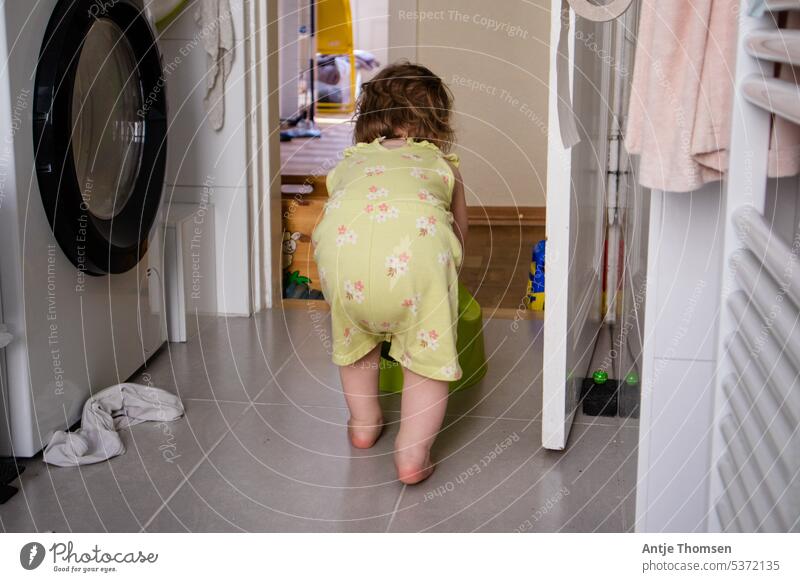 Toddler fetches potty from bathroom Potty montessori Photos of everyday life Documentary Child Untidy