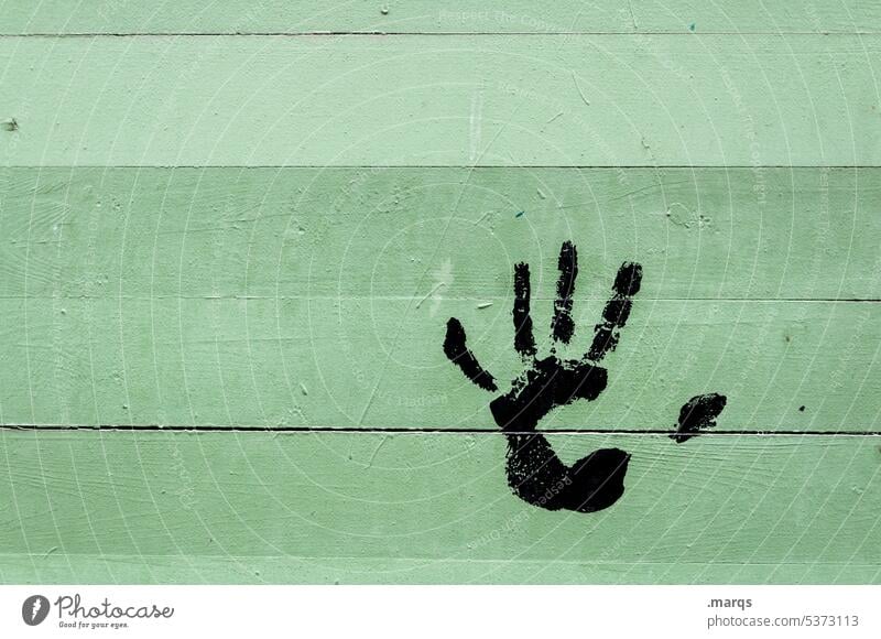 rubber stamp handprint Hand Imprint Touch Creativity Wall (building) Silhouette symbol attentiveness Attentive Palm of the hand Tracks Sign stop Hold Protective