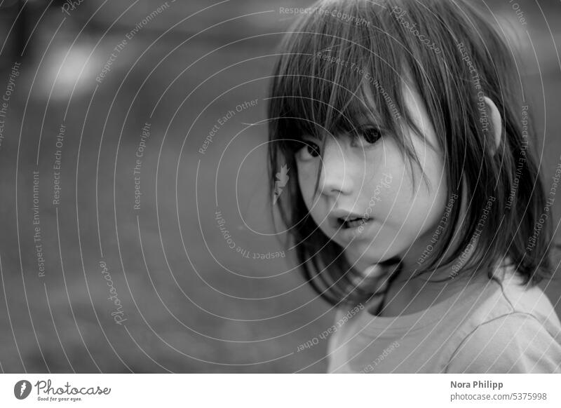 Look of a little girl Girl Girl`s face Portrait of a young girl Face Child Infancy Childhood memory Earnest asking black hair Human being portrait Looking