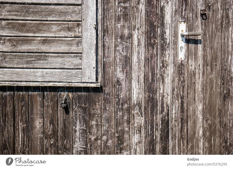 Wooden facade with door and shutter Shutter House (Residential Structure) Facade Exterior shot Architecture Wall (building) Closed Colour photo Day Building