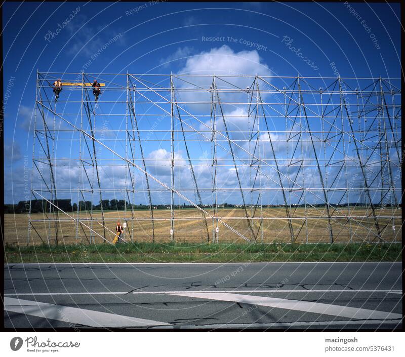 Protective structure for power lines on a country road high voltage Electricity Energy Energy industry High voltage power line stream Power transmission