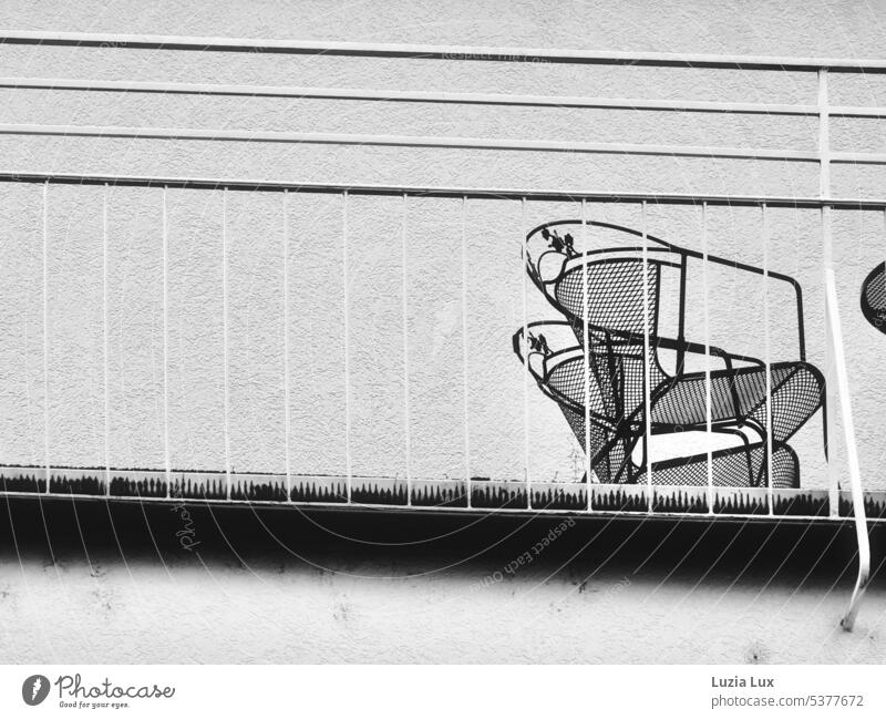 seen from below: Balcony in the city, bw Chair chairs urban Town Summer Summertime lines Direct Empty Seating Vantage point stacked