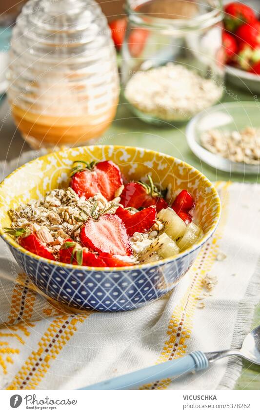 Healthy breakfast bowl with strawberries and oats granola, front view healthy healthy eating meal muesli yogurt berry diet organic strawberry food