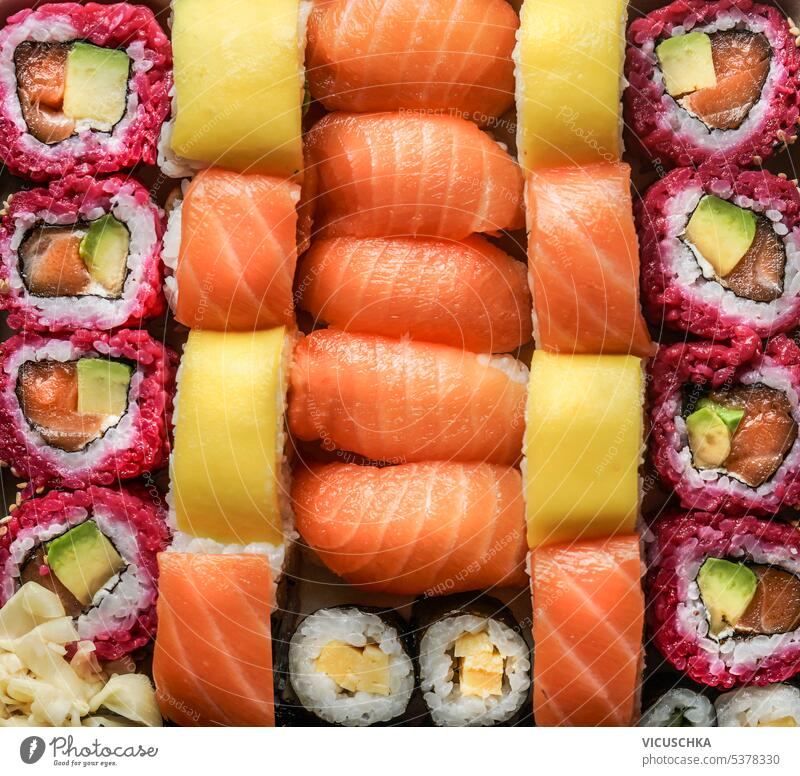 Sushi set background with various nigiri, maki and sushi rolls. Top view top view japanese food asian food healthy seafood fish avocado overhead salmon shrimp