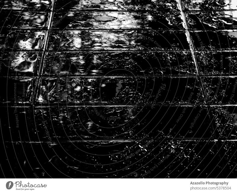 Black and white image of tiles. Tiles background. abstract architectural feature backgrounds black black and white black background black minimalism close up