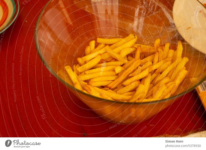 French fries in a glass key on a red table bowl Childrens birthsday Nutrition Infancy Eating Appetite Unhealthy Finger food Snack bar Food Table enjoyment