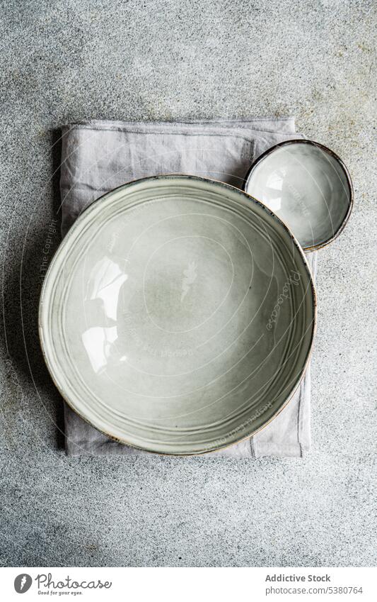 Top view grey ceramic tableware asia asian background bowl concrete dinnerware eat eating meal place plate set setting dishware festive serve table setting