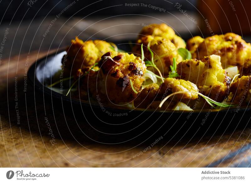 Delicious roasted cauliflower with herbs board vegetable food delicious dish tradition cuisine ecuadorian natural appetizing plate serve delectable kitchen