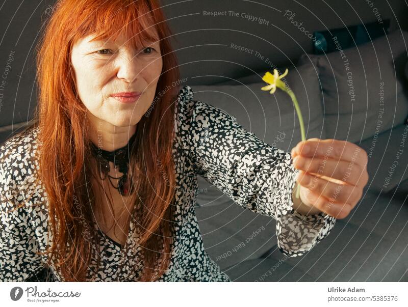 Flower for you | woman with red long hair hands over a flower warm Mouth Brilliant Sympathy Optimism Authentic Friendliness Upper body Woman Red-haired Feminine