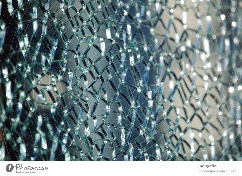 Shattered glass pane Broken Shard Mosaic Light Jump Transparent Derelict Window pane Glass Crack & Rip & Tear Shadow Blue Net Structures and shapes Clarity